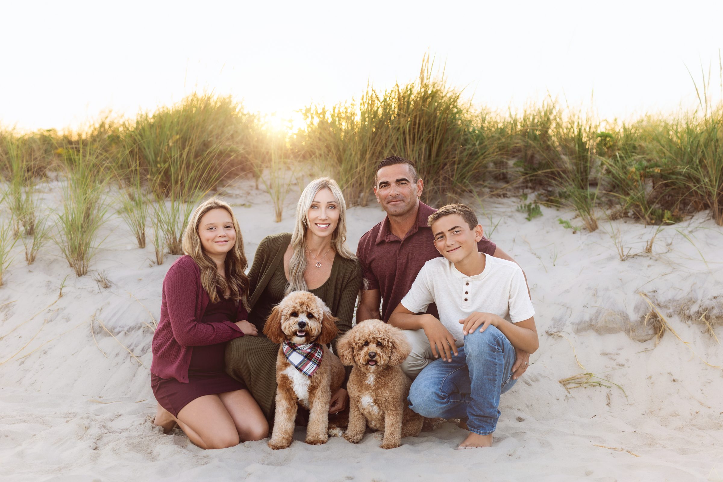 A happy family with their new Sandy Paws puppy